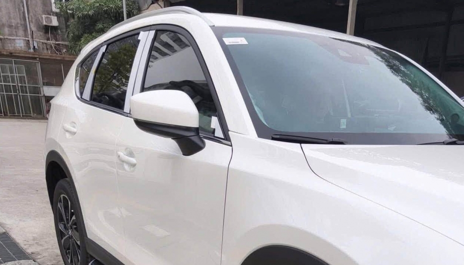 Mazda CX-5 bị lỗi gập gương thì sửa thế nào các bác?
