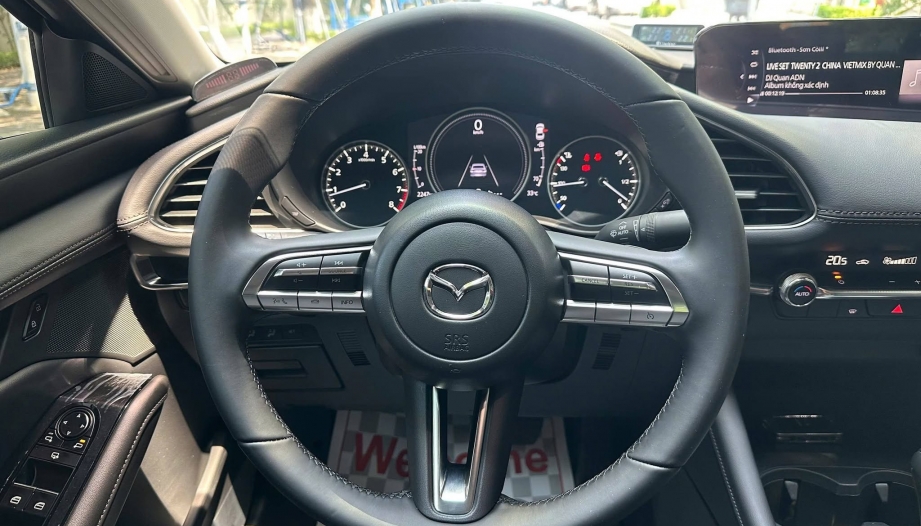 Xin tư vấn lỗi đánh lái xe Mazda3 có tiếng cạch cạch
